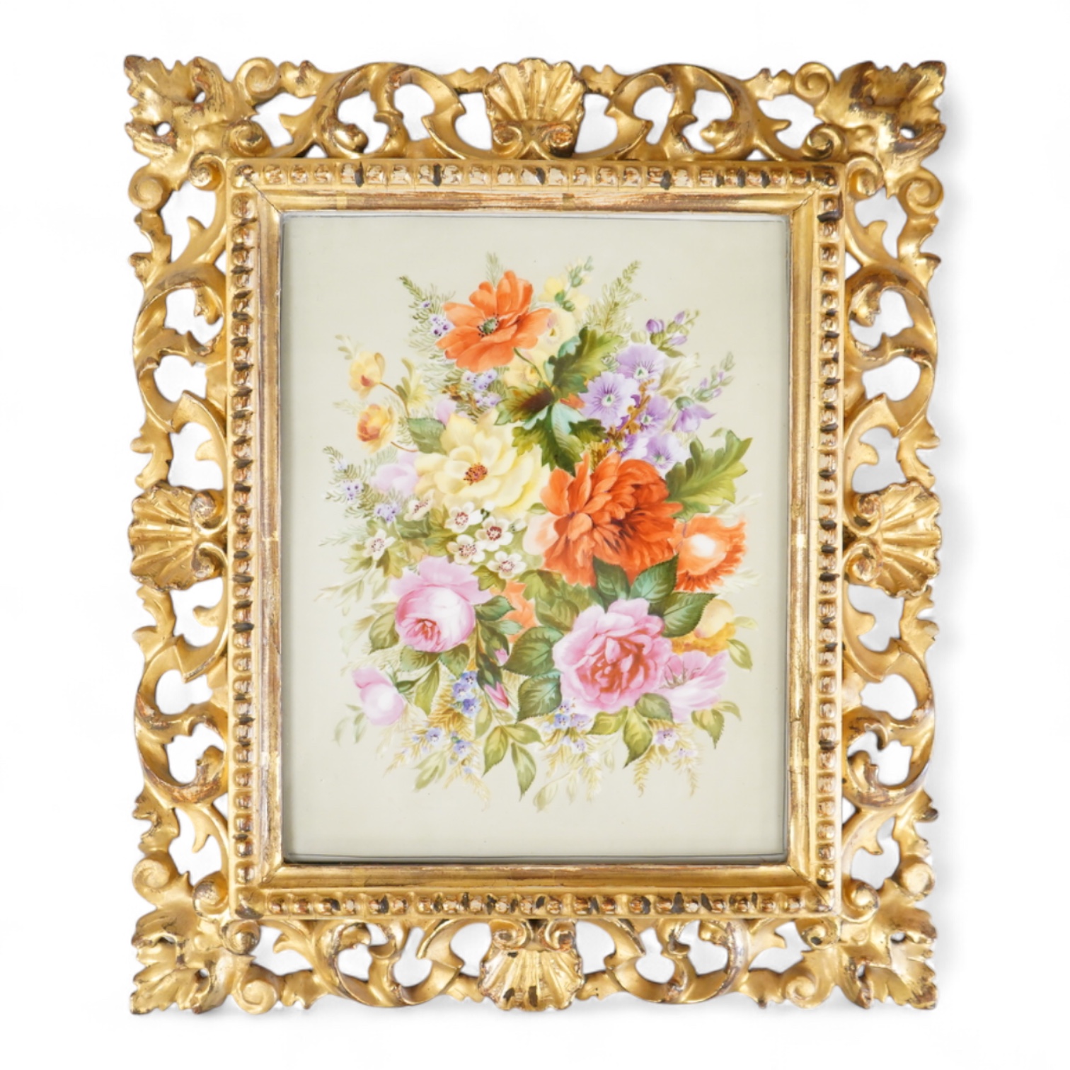A late 19th century English flower painted porcelain plaque in ornate Florentine giltwood frame, 18.5cm wide x 24cm high